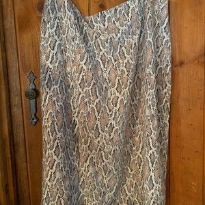 Snakeskin pencil skirt with slit
